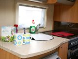 Worktop space is limited but a fitted chopping board helps