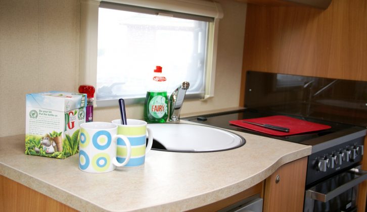 Worktop space is limited but a fitted chopping board helps