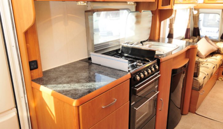 Large kitchen offers excellent storage and plenty of space to prepare meals