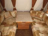 The generous front lounge in the 2009 Swift Charisma 565, reviewed by Practical Caravan