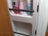 Washroom's column of plastic moulded shelves is a useful addition in the 2009 Swift Charisma 565, reviewed by Practical Caravan