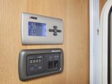 Digital central heating controls are located by door and easy to use in the 2012 Buccaneer Caravel