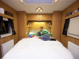 Island bed has comfy memory foam mattress in the 2012 Buccaneer Caravel reviewed by Practical Caravan