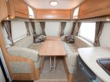 Modern fabrics and locker door design create a very attractive lounge area in the 2010 Coachman Laser 650/4 four-berth caravan, says Practical Caravan's expert reviewer