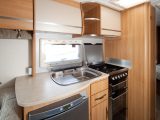 The kitchen is attractive, with good work space and excellent equipment in the 2010 Coachman Laser 650/4 – read Practical Caravan's expert review, with specs and prices