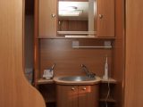 The Adria Adora 542's washbasin has plenty of storage options around it, say the expert reviewers from Practical Caravan magazine
