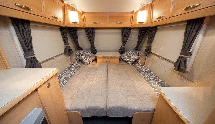 The roomy front bed sits on sliding wood slats in the 2010 Elddis Avanté 505: read our expert review
