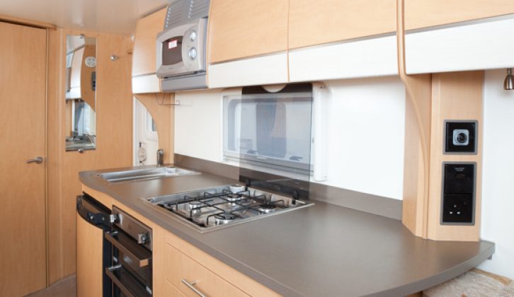 Kitchen has good worktop space, four-burner hob and large sink