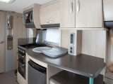 Storage options in the kitchen are good, with cupboards and shelving: 2010 Sterling Eccles Moonstone review by Practical Caravan's experts