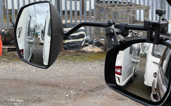 A car's mirror and a towing mirror