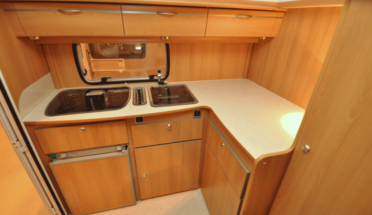 There’s plenty of seating for two persons; good roof locker storage is provided in the Trigano Silver 310 TL pop-top caravan reviewed by the experts at Practical Caravan