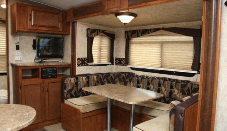 A good-sized dinette converts to a double bed in the slide-out portion of this unusual caravan