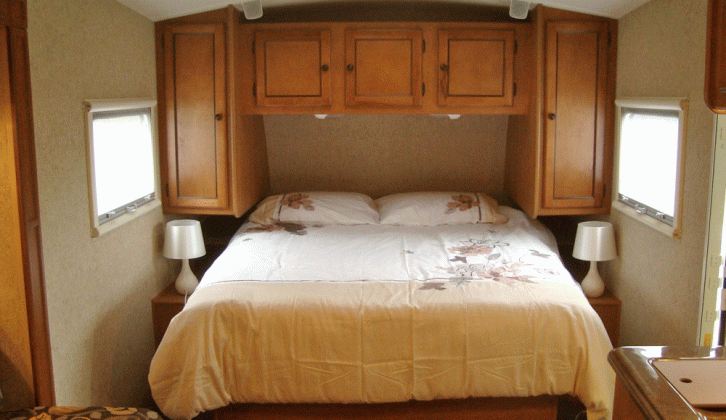 The island bed in the 1-RV Edge M21 has plenty of space around and good storage