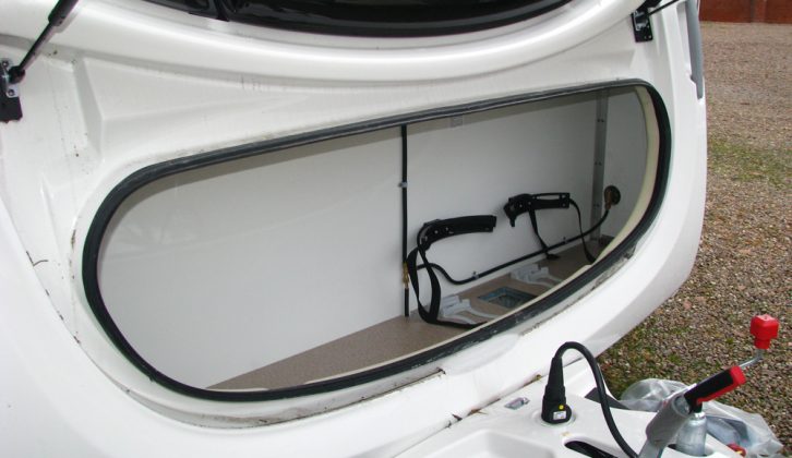 Front locker lid in the 2013 Swift Conqueror 645, reviewed by Practical Caravan