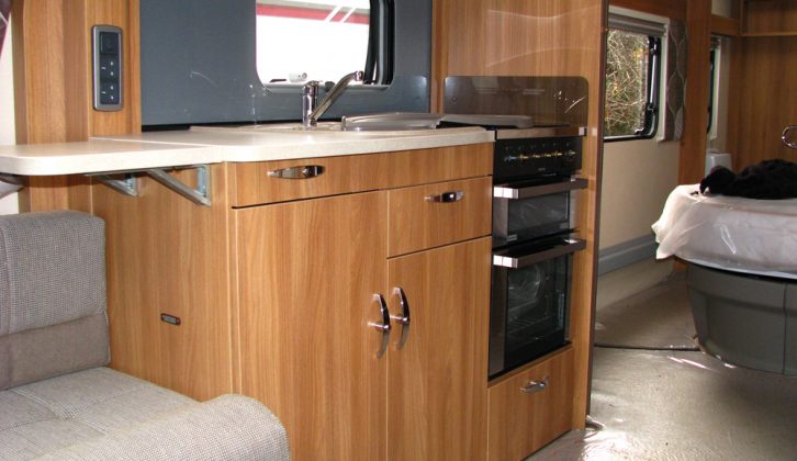 Kitchen in the 2013 Swift Conqueror 645, reviewed by Practical Caravan