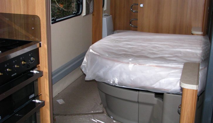 Fixed bed in the 2013 Swift Conqueror 645, reviewed by Practical Caravan