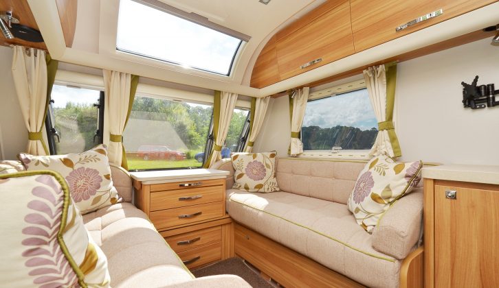 The sunroof lets daylight into the lounge. The 2013 Cyclone had lockers here, but you won’t miss them. The overhead lockers are deeper than before. The seats are too short to be used as twin beds, and the light-coloured upholstery is not ideal for young families.