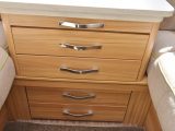 The centre chest has five drawers rather than the usual three