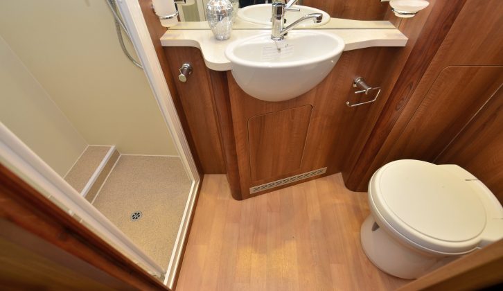 The shower cubicle is not moulded, but the washroom is well planned