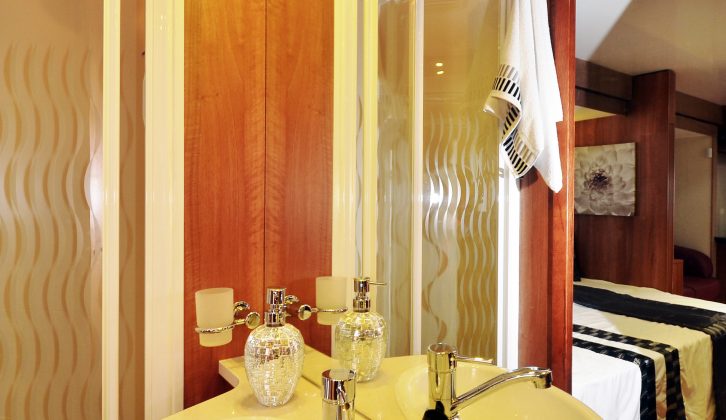 The washroom has no window, but a ceiling fan offers ventilation