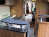 The slide-out kitchen makes generous use of the  space in the van. There's also a larder and lots of surfaces on which to prepare food