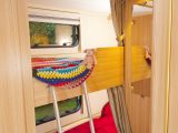 Separate reading lights, windows and a downlight above the  mirror make the children's room a pleasant place at bedtime or playtime