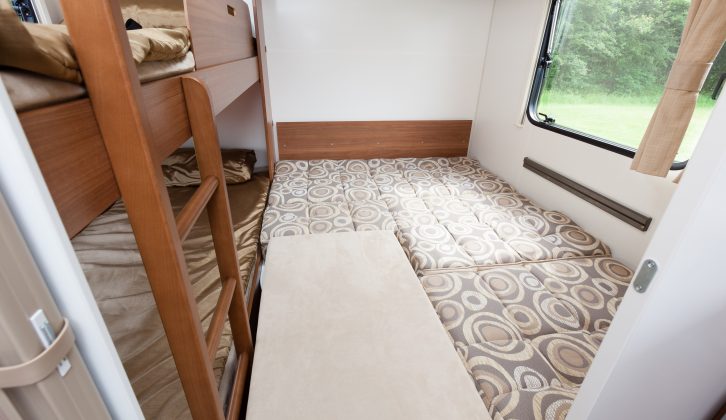 The rear lounge area converts to a double bed, using the clip-on table as a base