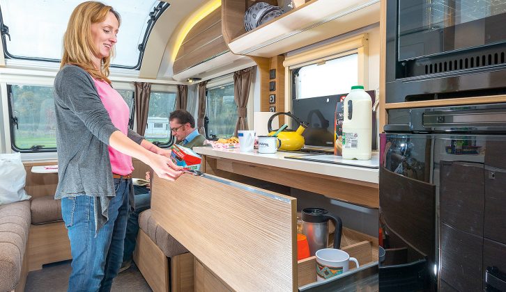 The kitchen unit is large, and features massive drawers that will swallow up all your pans and condiments