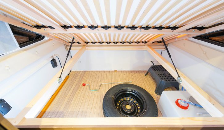 The cavernous fixed bed's box is home to the standard spare wheel and fresh-water tank
