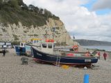 Get the best from your caravan holidays in Devon with Practical Caravan and visit Beer's popular pebble beach