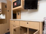 The dresser next to the door of the Avanté 462 has plenty of work surface and storage space
