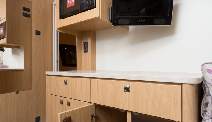 The dresser next to the door of the Avanté 462 has plenty of work surface and storage space