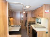 The midships kitchen of the Sprite Major 6 has a three-burner hob, separate oven and grill and lots of worktop, while the offside dinette converts into bunk beds, Practical Caravan's testers say