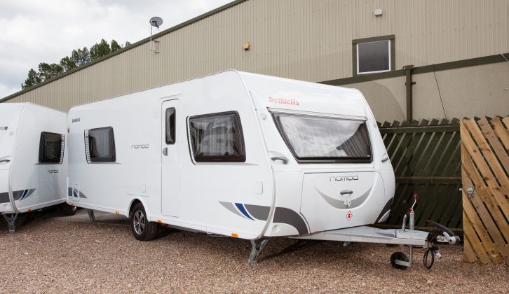 The Dethleffs Nomad 560 SB has its entrance door and awning rail on the offside