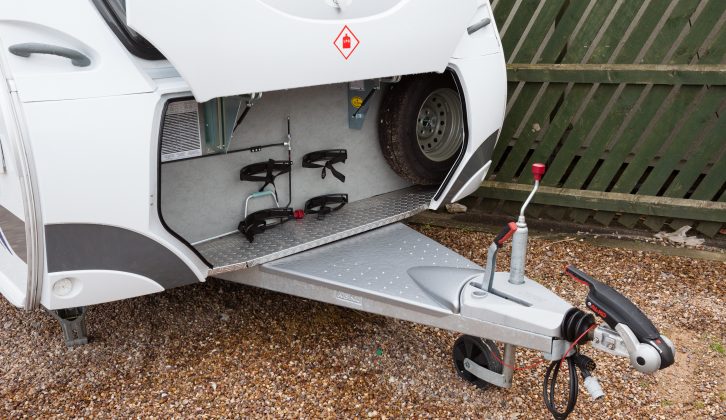 A spare wheel and two gas bottles fit behind the Dethleffs Nomad's cantilevered gas locker door