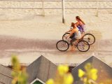Cycle to the sandy beach from your campsites in Bournemouth during caravan holidays in Dorset