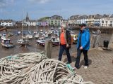 Take a relaxing stroll along the quay of Ilfracombe's busy fishing harbour when staying at one of the many campsites in North Devon on your caravan holidays in the West Country