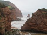 On your caravan holidays in South Devon, go and see the red rock Triassic cliffs near Sidmouth, visible where the Jurassic stone has eroded away