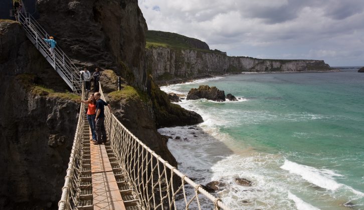 Wonderful views of the Antrim coast are the reward for those willing to walk along the Carrick-a-Rede rope bridge, suspended 80 feet above the sea, on their caravan holidays in Northern Ireland, maybe inspired by Game of Thrones