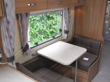 The offside dinette in Sprite's Quattro EW converts into bunks, which can be partitioned with a full-length curtain, but the expert reviewers at Practical Caravan complained that there was nowhere to store the curtain during the day