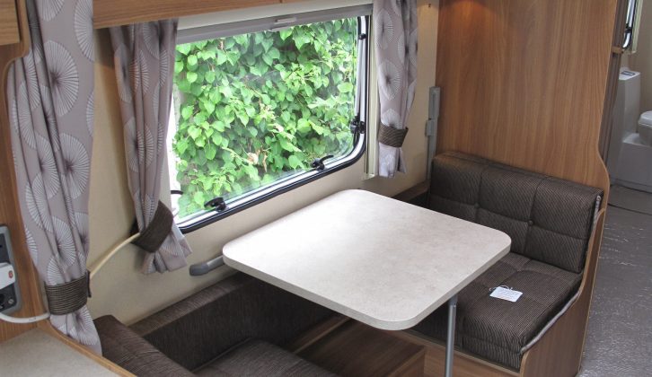 The offside dinette in Sprite's Quattro EW converts into bunks, which can be partitioned with a full-length curtain, but the expert reviewers at Practical Caravan complained that there was nowhere to store the curtain during the day