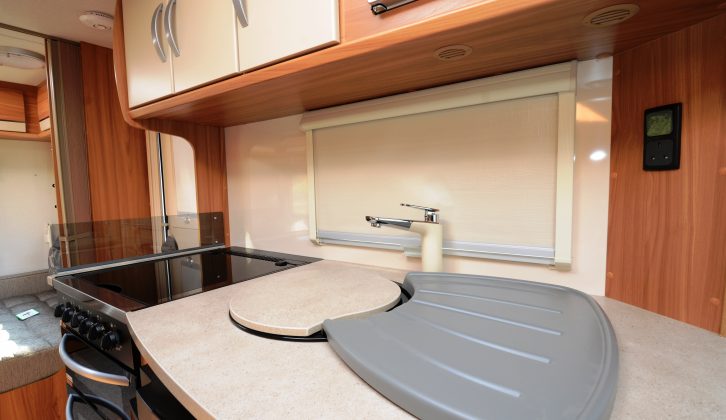 The kitchen in the Lunar Quasar 525 has ample worktop, storage options and appliances to prepare family meals, say Practical Caravan's reviewers