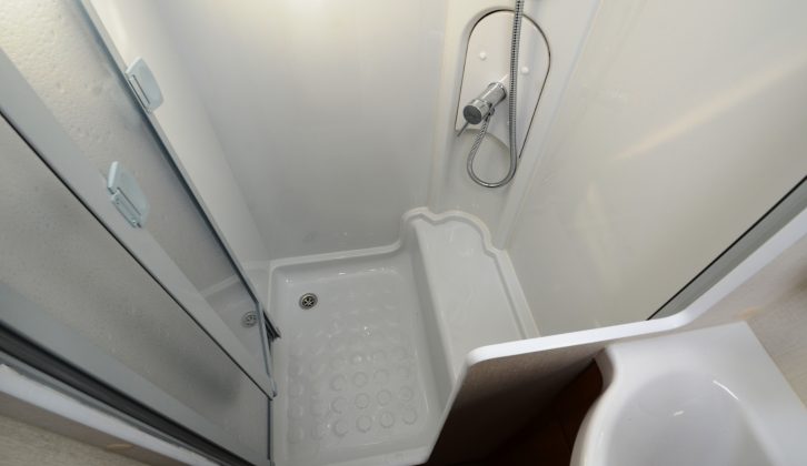 The shower cubicle in the Lunar Quasar 525 is not fully lined, but Practical Caravan's experts noted with approval that it has the excellent Ecocamel showerhead