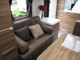 A distinctive and plush two-seater sofa is on the nearside of the lounge in the Adria Astella Glam Edition Rio Grande, praised by Practical Caravan's reviewers