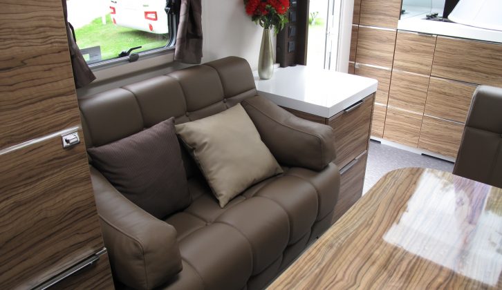 A distinctive and plush two-seater sofa is on the nearside of the lounge in the Adria Astella Glam Edition Rio Grande, praised by Practical Caravan's reviewers
