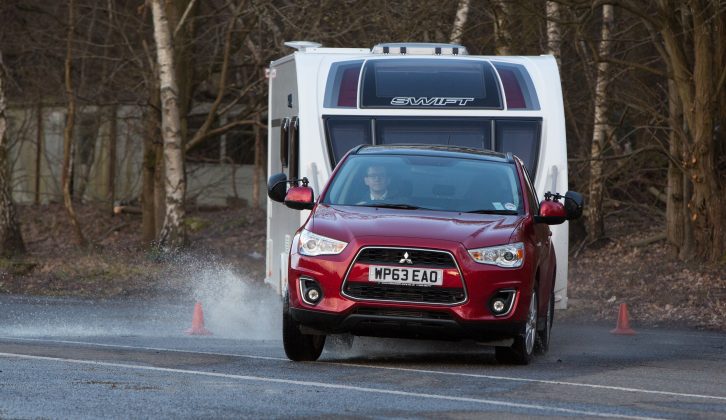 The Mitsubishi ASX leaned heavily when pushed hard in our lane-change test, something to consider when deciding what tow car to buy next