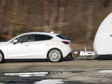The Mazda 3 accelereated from 30 to 60mph in 14.4 seconds in Practical Caravan's test, despite the heavy caravan