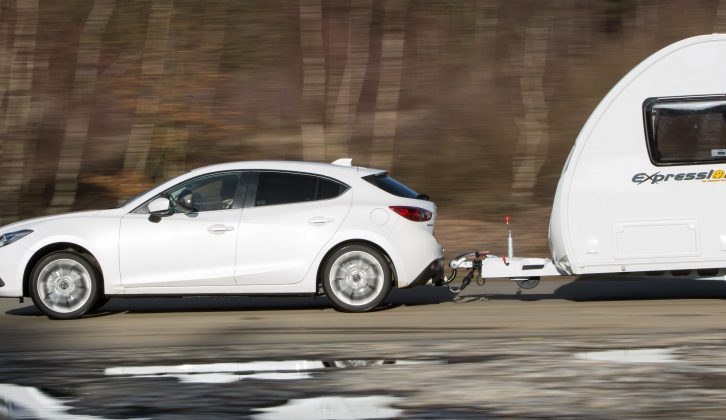 The Mazda 3 accelereated from 30 to 60mph in 14.4 seconds in Practical Caravan's test, despite the heavy caravan