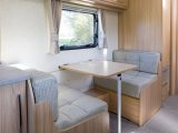Practical Caravan's reviewers suggest that the offside dinette in the Coachman Vision 580/5 is ideal as a games table for youngsters or for a morning coffee before parents disassemble their double bed