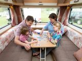 The front lounge of the Bailey Pursuit 560-5 is big enough for four, and the large shelf below the window is great for putting things, say Practical Caravan's expert reviewers